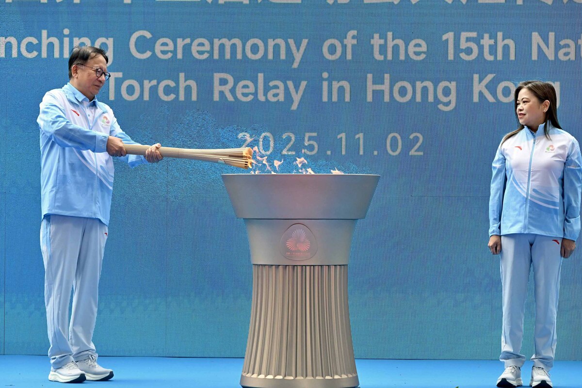 起跑儀式:  陳國基（左）和文化體育及旅遊局局長羅淑佩早上主持起跑儀式。