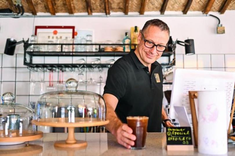 Frank Sterzer, from Germany, runs a cafe named "Bamboo Coffee" in Maoli Village... Frank Sterzer, from Germany, runs a cafe named "Bamboo Coffee" in Maoli Village...