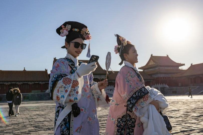 Tourists visit the Palace Museum, also known as the Forbidden City, in Beijing, capital of China...