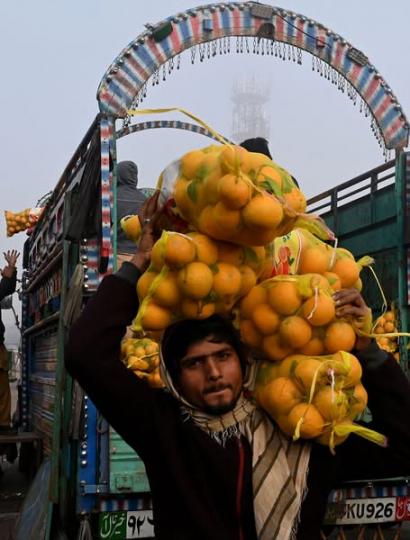 Workers are hard at work transporting...