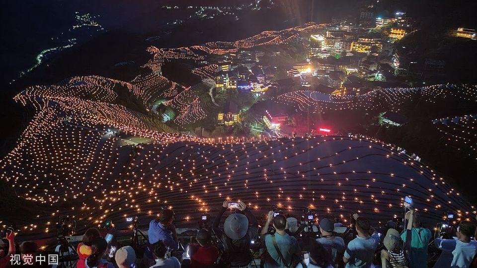 the Comb Rice Festival, celebrated in Guilin, in...