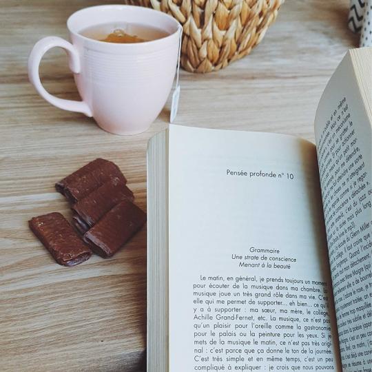 The perfect break: a cup of coffee, a good book and a delicious snack !...
