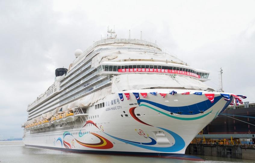 China's first domestically-built large cruise ship, the "Adora Magic City," left port in Shanghai on...
