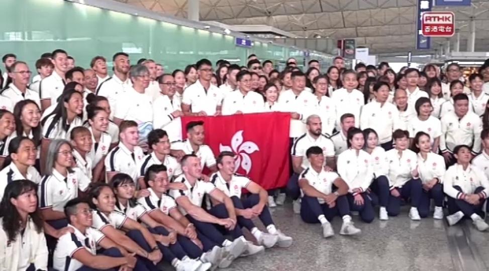 姚錦成莫宛螢
任杭州亞運
港隊開幕禮持旗手....