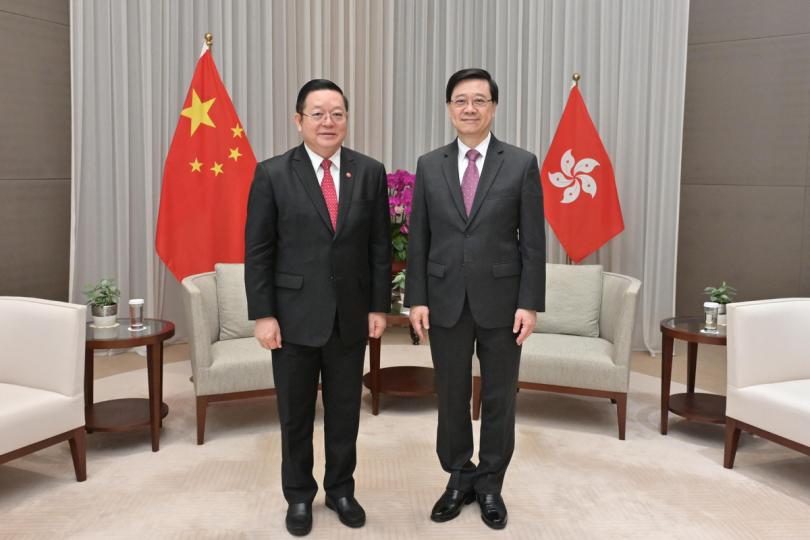 加強聯繫: 李家超(右)與高金洪會面。 加強聯繫: 李家超(右)與高金洪會面。