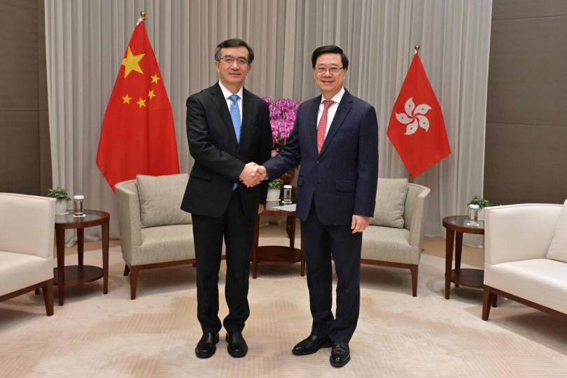 相見歡:  李家超（右）與羅東川會面。