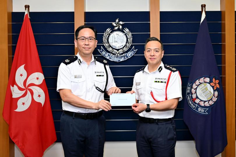 經驗豐富:  梁世光（左）獲委任為香港輔助警察隊總監。