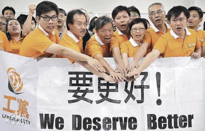 工黨昨日決定出戰立法會3個地區直選選區,圖為擬出選的郭永健(前排左起)、張超雄、李卓人、譚駿賢、何秀蘭、鍾松輝和鄭司律。 (何家達攝) (明報製圖) 工黨昨日決定出戰立法會3個地區直選選區,圖為擬出選的郭永健(前排左起)、張超雄、李卓人、譚駿賢、何秀蘭、鍾松輝和鄭司律。 (何家達攝) (明報製圖)