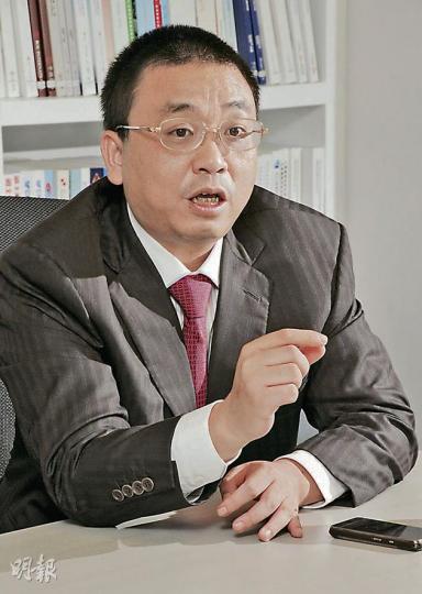 中國無線執行董事兼財務總監蔣超稱,將以低價競爭去搶hTC、摩托羅拉及諾基亞市場,目標是5年內打進全球市場前5位。(陳淑安攝) 中國無線執行董事兼財務總監蔣超稱,將以低價競爭去搶hTC、摩托羅拉及諾基亞市場,目標是5年內打進全球市場前5位。(陳淑安攝)