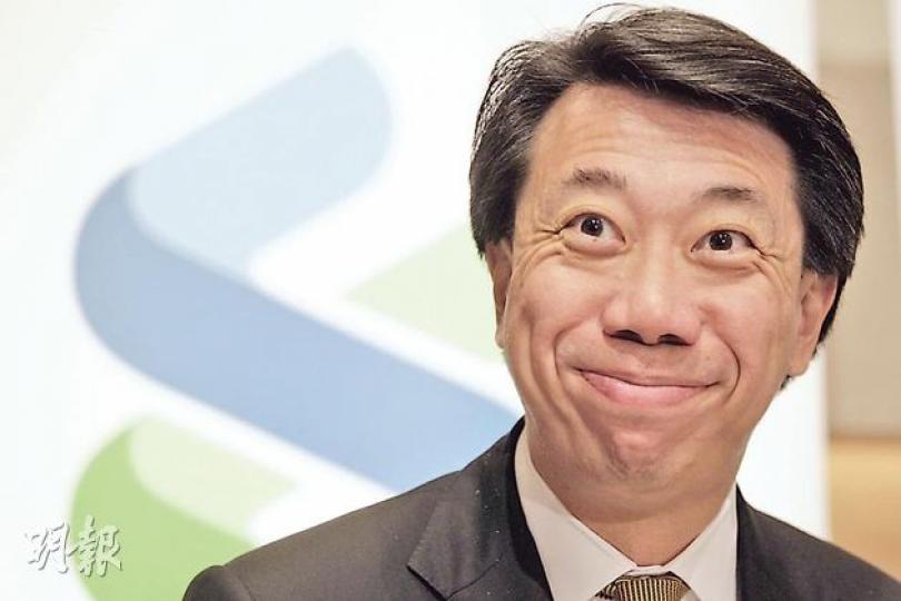 渣打香港行政總裁洪丕正於業績後記者會上表示，金管局要求新做按揭風險加權資產比率達到15%水平，估計會令按揭成本增加0.2至0.25厘。（郭慶輝攝）

