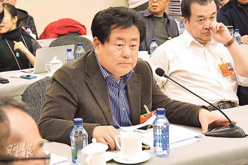 政協委員徐沛東借用法輪功的例子,指摘國家文化出口政策不健全。(明報記者攝) 政協委員徐沛東借用法輪功的例子,指摘國家文化出口政策不健全。(明報記者攝)