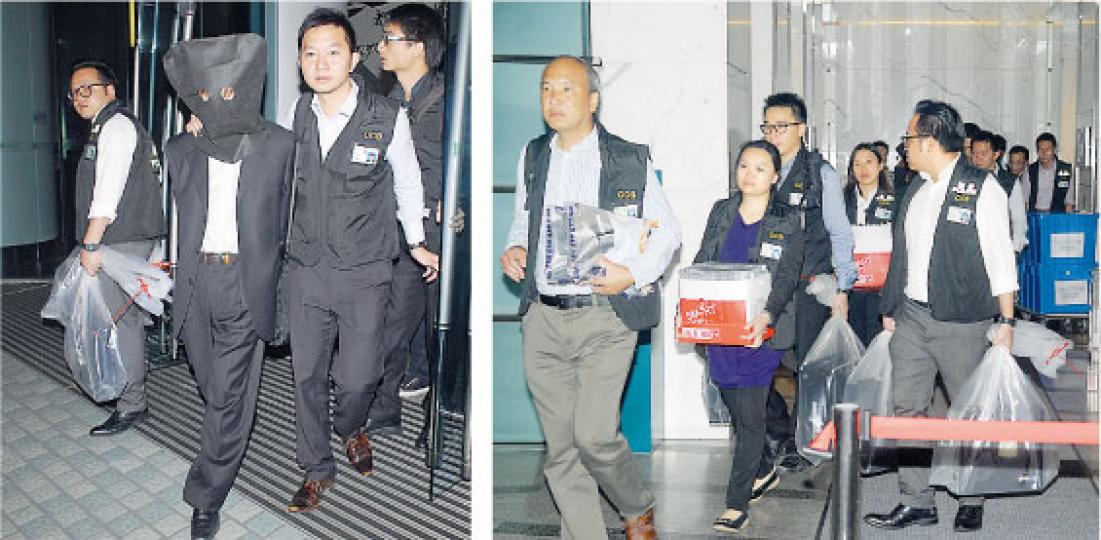商業罪案調查科探員昨晚在紅磡都會大廈一辦公室內拘捕4男1女(左圖),全部涉嫌違反禁止層壓式計劃條例被扣查,探員並檢走大量文件及電腦資料作證物(右圖)。(伍浦鋒攝) 商業罪案調查科探員昨晚在紅磡都會大廈一辦公室內拘捕4男1女(左圖),全部涉嫌違反禁止層壓式計劃條例被扣查,探員並檢走大量文件及電腦資料作證物(右圖)。(伍浦鋒攝)