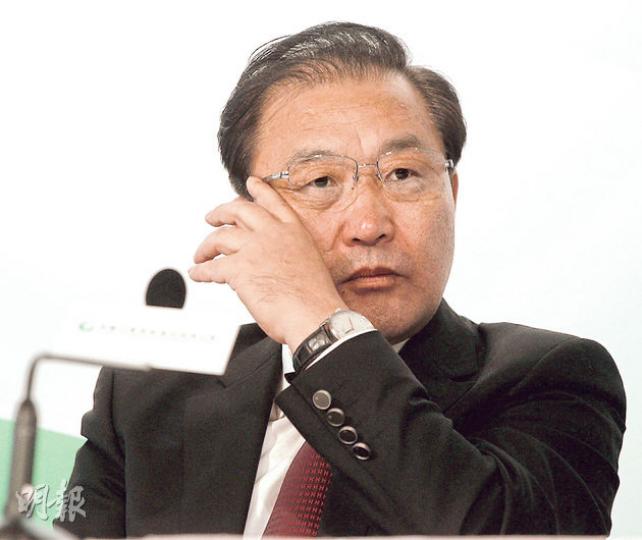 中國人壽董事長楊明生不認為中央會一刀切對待央企高管的薪金，但會偏向於市場化的手法調整。（李紹昌攝）