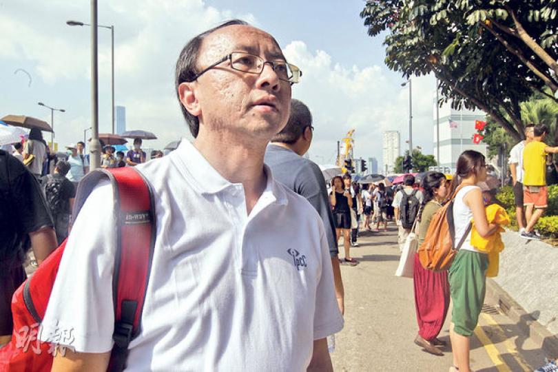 監警會委員、港大法律學者張達明表示,由於佔中事出突然,昨日個人以監警會委員身分到現場觀察。(郭慶輝攝) 監警會委員、港大法律學者張達明表示,由於佔中事出突然,昨日個人以監警會委員身分到現場觀察。(郭慶輝攝)