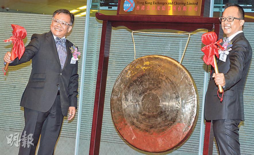 壹照明昨日創業板掛牌,股價逆市升7倍。圖為公司主席許國釗(左)及總裁許國強(右)。(劉焌陶攝) 壹照明昨日創業板掛牌,股價逆市升7倍。圖為公司主席許國釗(左)及總裁許國強(右)。(劉焌陶攝)