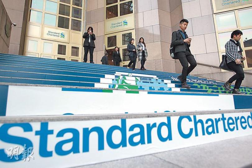 渣打昨早突然宣布結束企業現金證券、證券研究及證券融資市場業務,全球裁員200人,香港佔100人。集團預期,今年會繼續減少2000個職位。(郭慶輝攝) 渣打昨早突然宣布結束企業現金證券、證券研究及證券融資市場業務,全球裁員200人,香港佔100人。集團預期,今年會繼續減少2000個職位。(郭慶輝攝)
