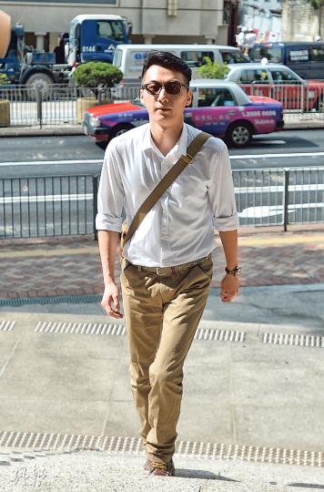 人稱「四眼哥哥」的鄭錦滿昨否認於去年聖誕日凌晨，在佔旺現場衝擊警方封鎖線，阻差辦公。（鄧宗弘攝）