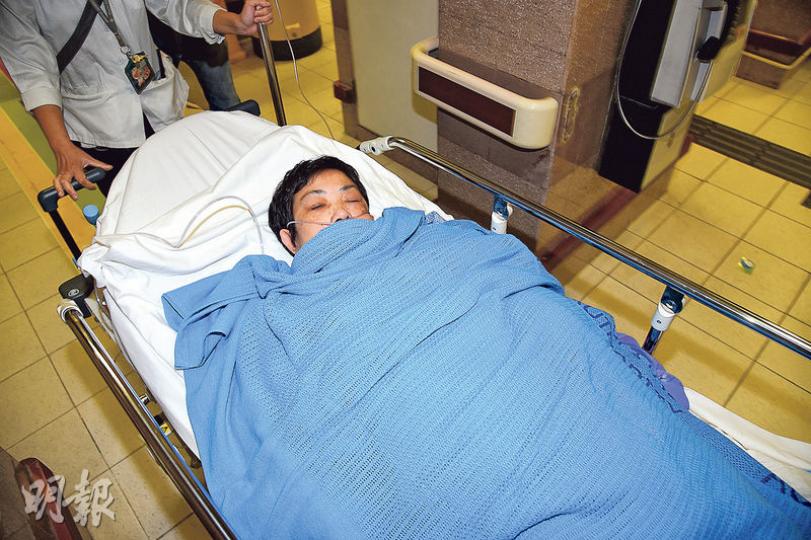 遭丈夫淋松節水縱火燒傷的女事主，清醒送院治理後，現情况穩定留院。（蔡方山攝）