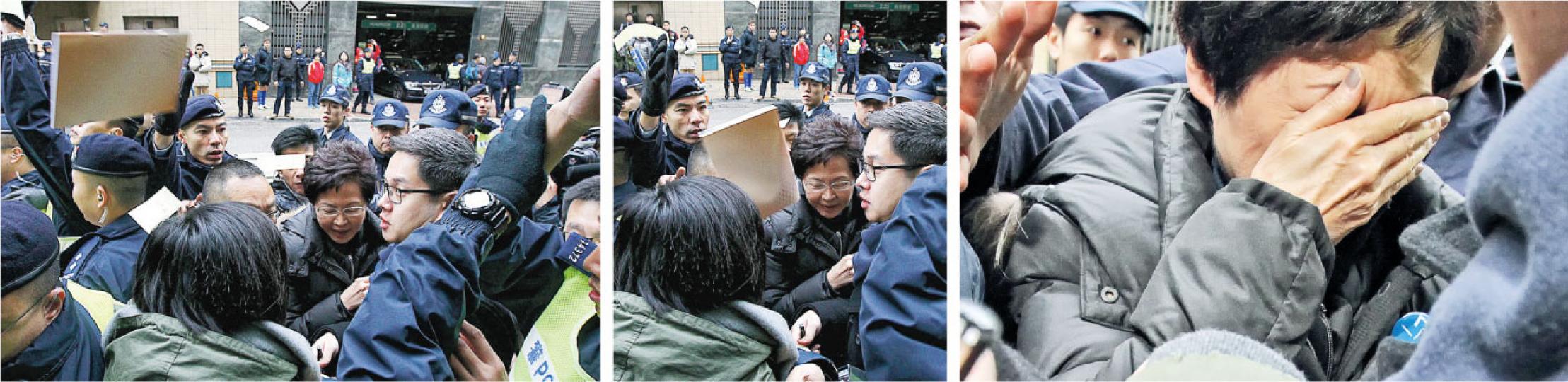 政務司長林鄭月娥昨出席退保諮詢會,在場外遇上示威,其間有人拋擲退保諮詢文件(左圖及中圖),擊中林鄭月娥臉部,她立即脫下眼鏡及掩面(右圖),表情痛苦。(李紹昌攝) 政務司長林鄭月娥昨出席退保諮詢會,在場外遇上示威,其間有人拋擲退保諮詢文件(左圖及中圖),擊中林鄭月娥臉部,她立即脫下眼鏡及掩面(右圖),表情痛苦。(李紹昌攝)