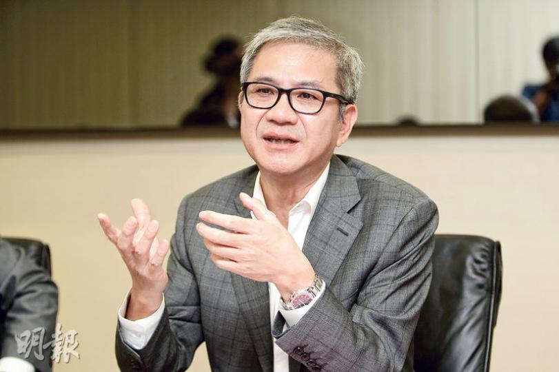 按證公司執董兼總裁李令翔表示,按證公司正積極研究改善擔保計劃的申請程序,料第3季內完成。(林俊源攝) 按證公司執董兼總裁李令翔表示,按證公司正積極研究改善擔保計劃的申請程序,料第3季內完成。(林俊源攝)