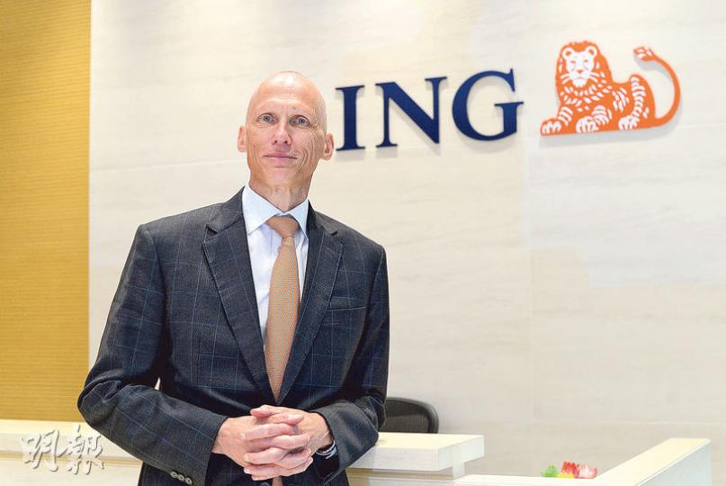 Tim Condon認為，美國、德國及日本長債孳息率均是當地金融市場無風險利率的指標，可用來評估當地其他資產的合理值，若有關孳息率悉數飆升，其他資產價格亦會受壓。（楊柏賢攝）