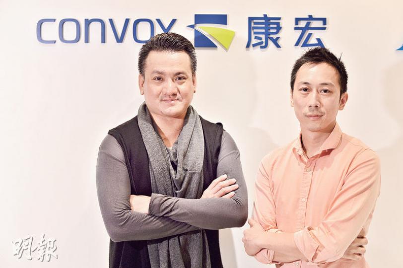 康宏張永達（右）及張永恒（左）均認為未來數個月是港人海外置業的好時機。（馮凱鍵攝）
