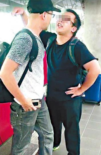 ■港男遊客(右)與大馬遊客在台灣機場捷運月台對罵。
■港男遊客(右)與大馬遊客在台灣機場捷運月台對罵。