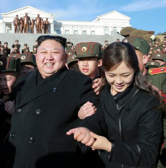 ■金正恩及李雪主。資料圖片 ■金正恩及李雪主。資料圖片
