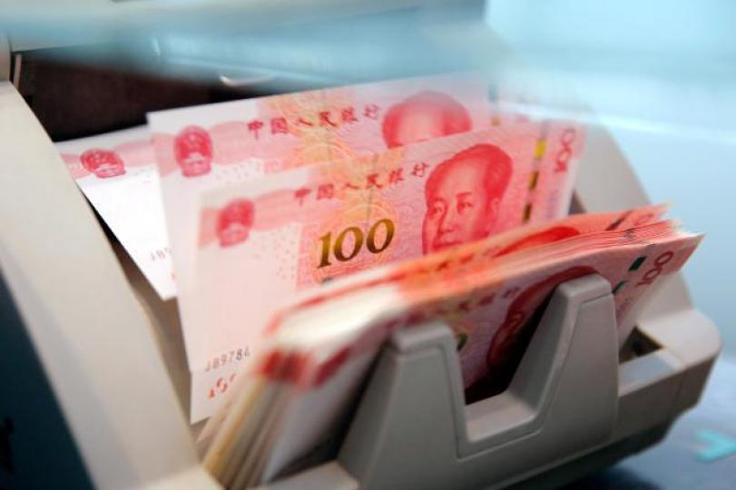 ■人民幣在岸價昨單日貶值0.95%，為今年1月以來最大單日跌幅。　資料圖片

