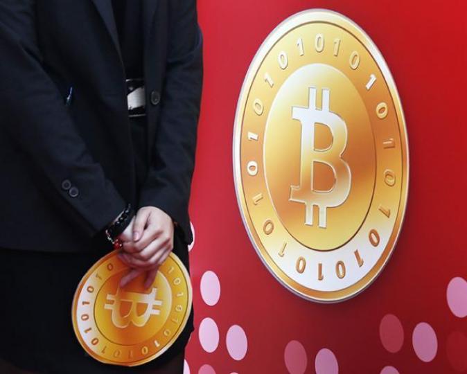 ■中國關閉Bitcoin交易平台，意味着由央行自己搞嘅數字貨幣將要出現。　資料圖片