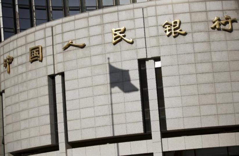 ■人民銀行大比例降準，說明中共十九大之前將全力推動經濟向前加速發展。　資料圖片
