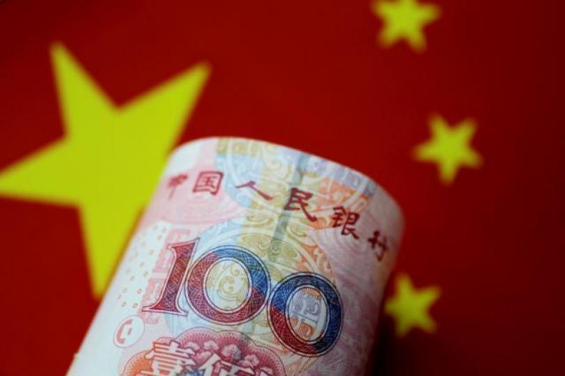 ■相較於歐元和英鎊等貨幣,人民幣的國際使用量依然較低。資料圖片 ■相較於歐元和英鎊等貨幣,人民幣的國際使用量依然較低。資料圖片