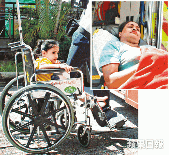 ■受傷的印尼裔母女由救護車送往廣華醫院治理。梁澤岡攝
■受傷的印尼裔母女由救護車送往廣華醫院治理。梁澤岡攝