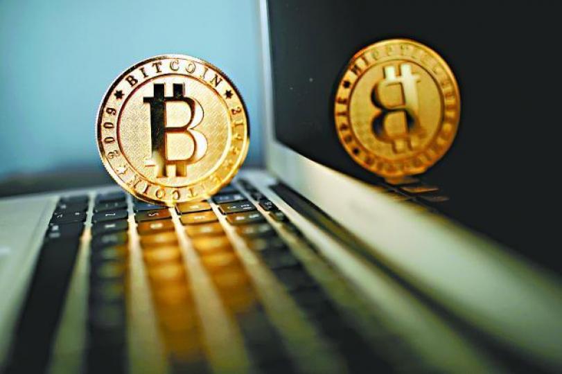 ■Bitcoin未能企穩6,000美元,昨曾回吐4.7%。資料圖片 ■Bitcoin未能企穩6,000美元,昨曾回吐4.7%。資料圖片