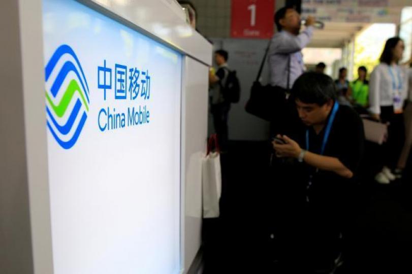 ■電訊業佔恒生指數比重6.33%,恒指要再爆上的話,最終都會炒起藍籌電訊股。資料圖片 ■電訊業佔恒生指數比重6.33%,恒指要再爆上的話,最終都會炒起藍籌電訊股。資料圖片