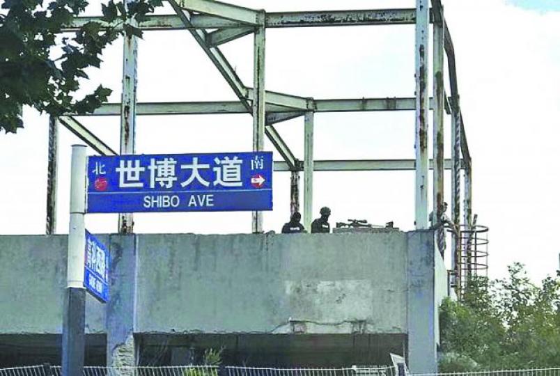 ■上海世博大道附近建築物有狙擊手戒備。■上海市中共一大會址外觀。 ■上海世博大道附近建築物有狙擊手戒備。■上海市中共一大會址外觀。