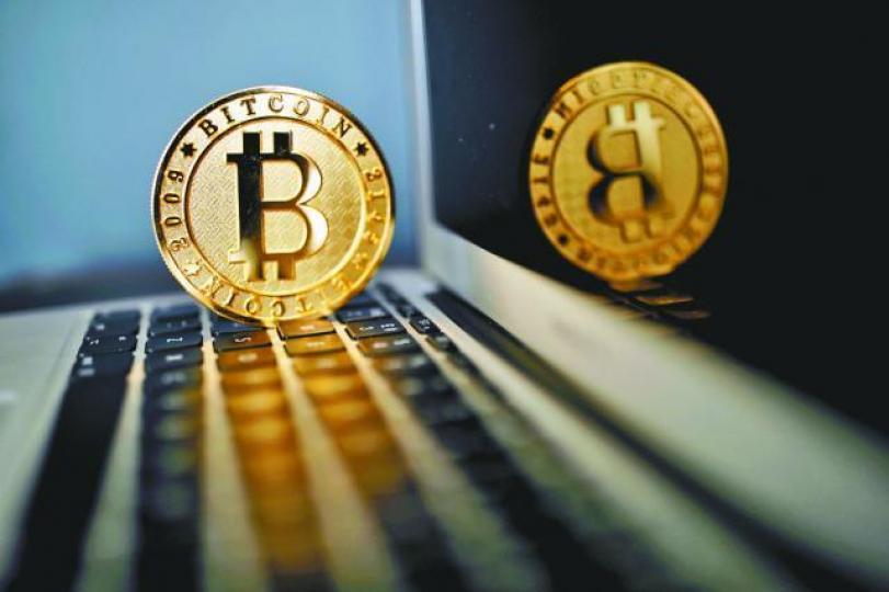 ■比特幣今年累積升幅擴大至6倍半,大幅跑贏現貨金價。資料圖片 ■比特幣今年累積升幅擴大至6倍半,大幅跑贏現貨金價。資料圖片