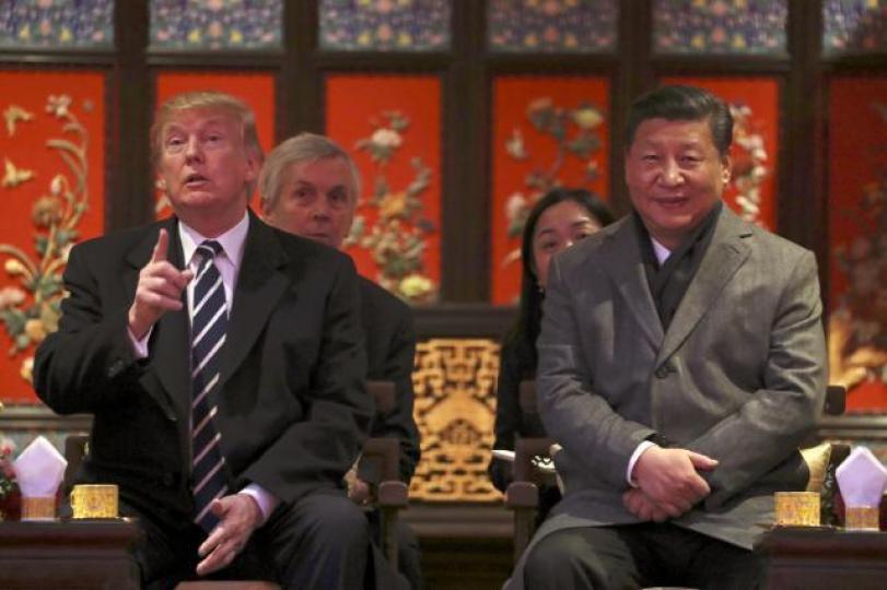 ■特朗普(右)和習近平會面除了簽大deal,私下場合應會談到中國人權話題。資料圖片 ■特朗普(右)和習近平會面除了簽大deal,私下場合應會談到中國人權話題。資料圖片