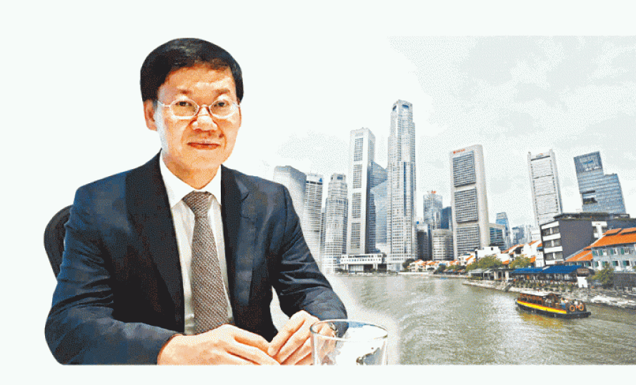 ■金管局李樹培指本地銀行接駁新加坡平台後,相信規模是全球最大;右圖為新加坡商業區。 ■金管局李樹培指本地銀行接駁新加坡平台後,相信規模是全球最大;右圖為新加坡商業區。