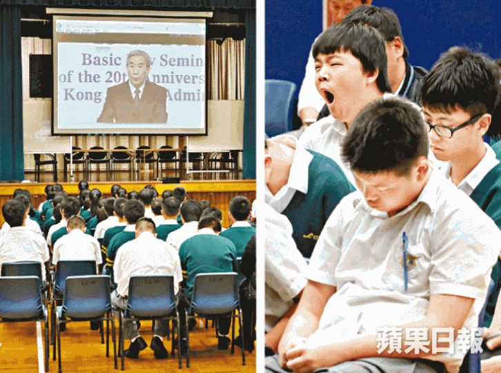 ■獅子會中學昨日安排學生收看李飛演講直播,不少學生打呵欠及睡着。何家達攝 ■獅子會中學昨日安排學生收看李飛演講直播,不少學生打呵欠及睡着。何家達攝