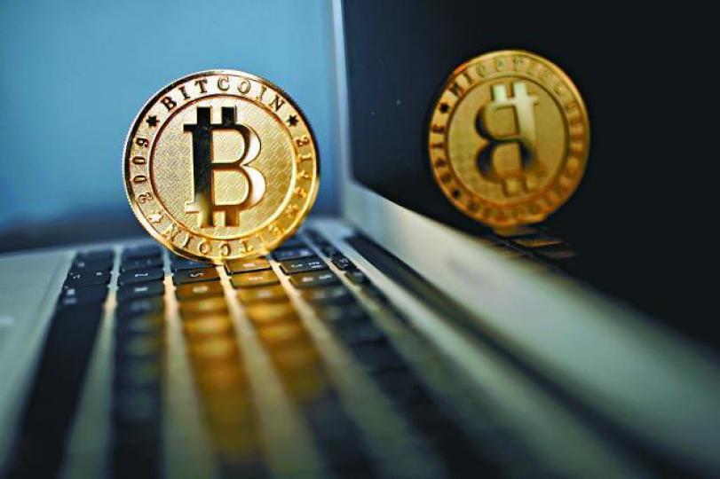 ■大摩主席指外界過度關注比特幣,超越其本身應得的注意力。資料圖片 ■大摩主席指外界過度關注比特幣,超越其本身應得的注意力。資料圖片