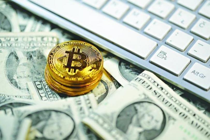■CME的1月比特幣期貨昨高開近6%後,一度急跌最多5.9%。資料圖片 ■CME的1月比特幣期貨昨高開近6%後,一度急跌最多5.9%。資料圖片