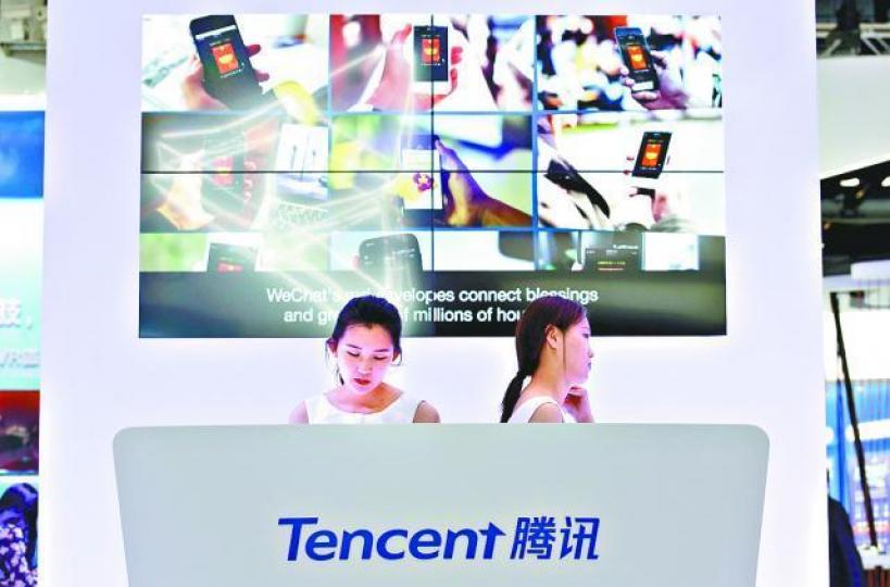 ■騰訊聯同京東入股唯品會,溢價達55%。資料圖片 ■騰訊聯同京東入股唯品會,溢價達55%。資料圖片