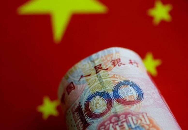 ■中國明年貨幣政策定調穩中偏緊,市場流動性料進一步收縮。資料圖片 ■中國明年貨幣政策定調穩中偏緊,市場流動性料進一步收縮。資料圖片