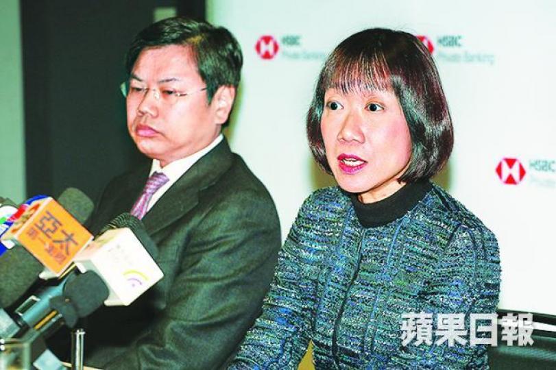 ■匯豐范卓雲(右)料港股首季波動性增加並可能整固。李潤芳攝 ■匯豐范卓雲(右)料港股首季波動性增加並可能整固。李潤芳攝
