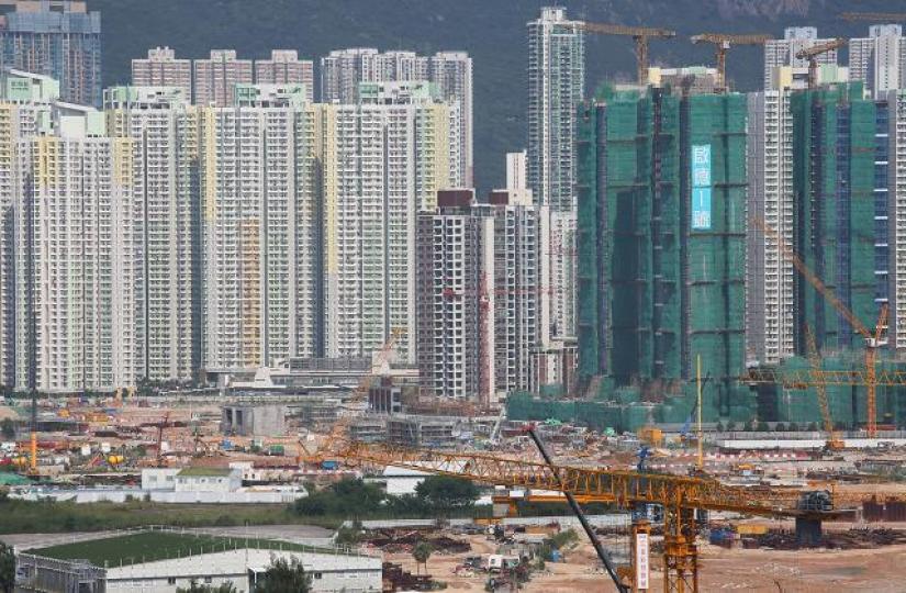 ■近年地產界最多人談及的,除了樓市會否爆煲外,就是中資攻港。資料圖片 ■近年地產界最多人談及的,除了樓市會否爆煲外,就是中資攻港。資料圖片