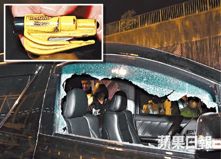 ■警員以破窗神器（小圖）擊毀車窗玻璃，將司機拉出拘捕。唐家輝攝