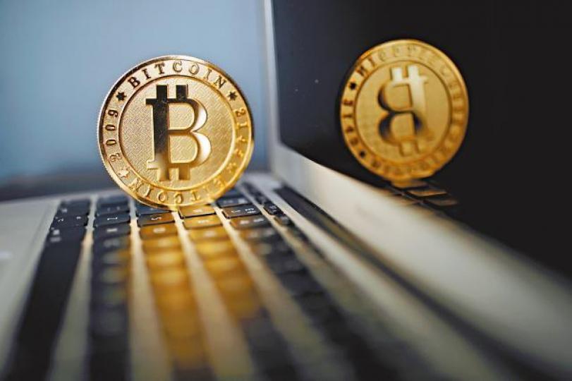 ■加密貨幣狂潮席捲全球，引發金融界重量級人馬激辯。資料圖片
