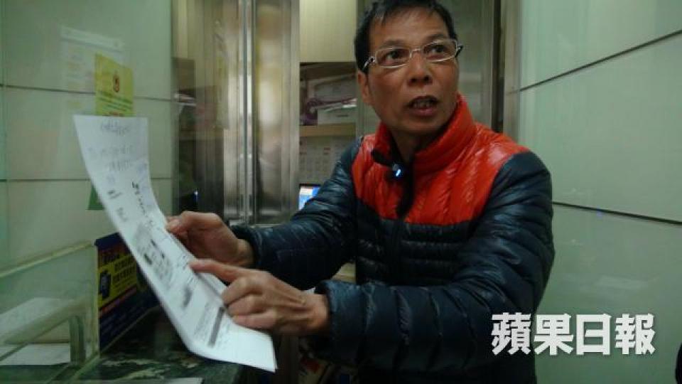 ■找換店負責人張先生。麥超億攝