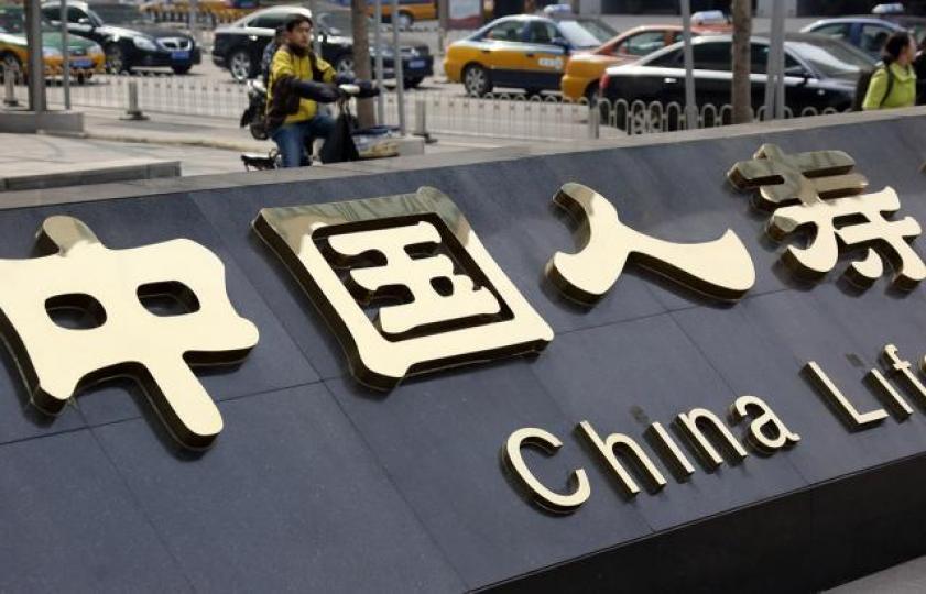 ■國壽是兩年多前奉命救市的國企之一,隨着上證指數上升,國壽手上的蟹貨變成上佳資產。資料圖片 ■國壽是兩年多前奉命救市的國企之一,隨着上證指數上升,國壽手上的蟹貨變成上佳資產。資料圖片